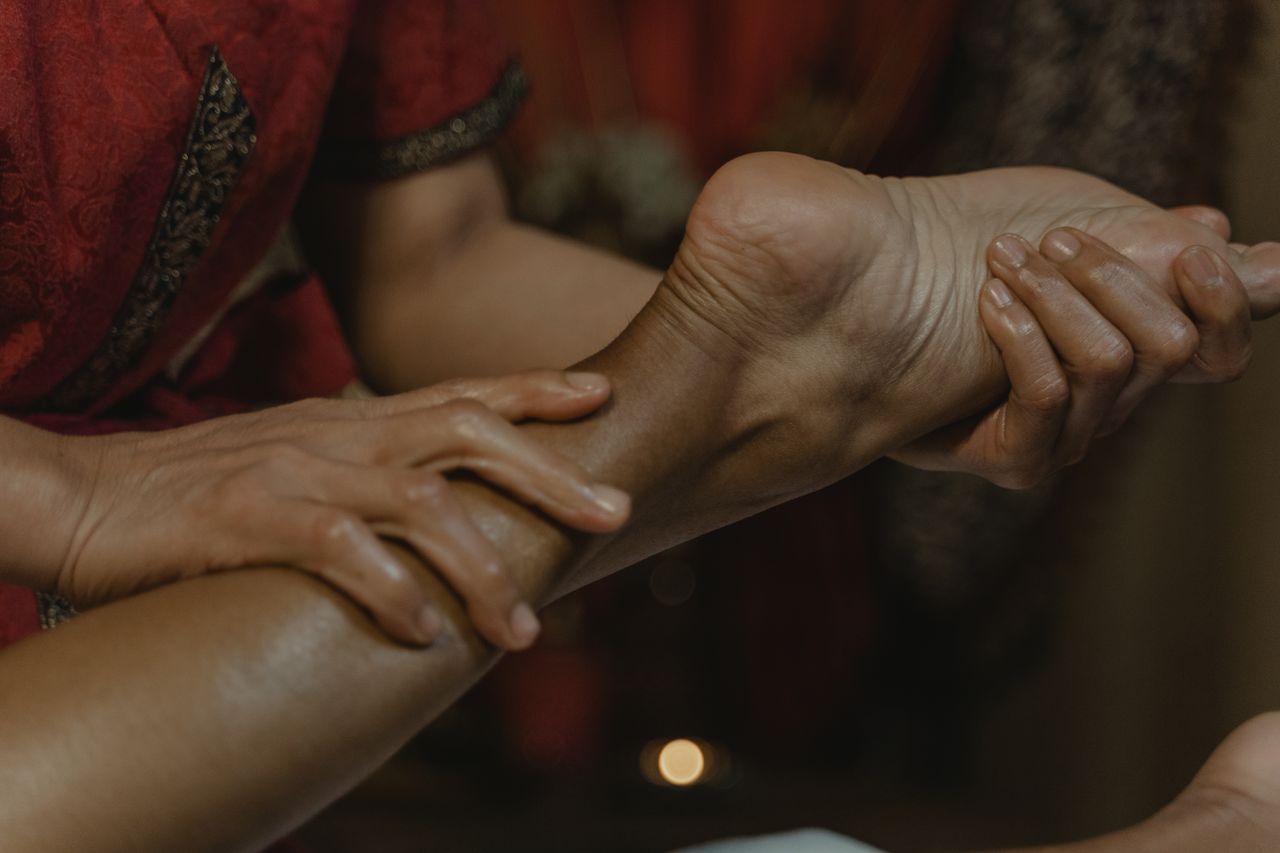 gallery-4 Close-up of a soothing foot massage at a spa, promoting relaxation and wellness.
